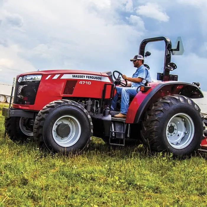 Massey Ferguson 4710 open-station tractor in a field